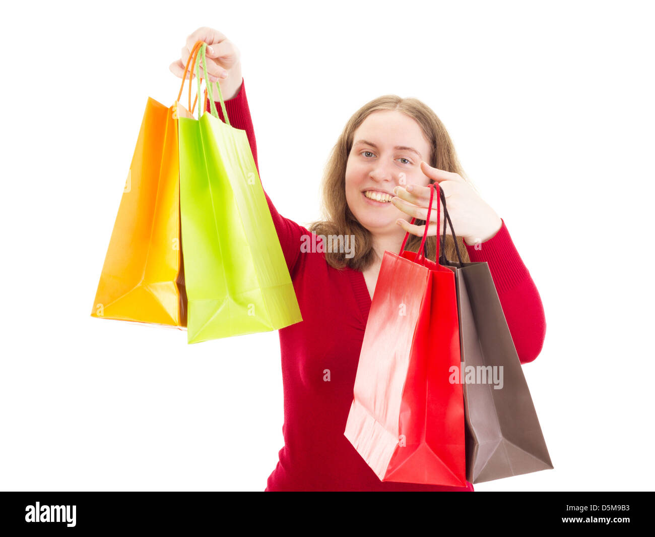Woman on shopping bags hi-res stock photography and images - Alamy