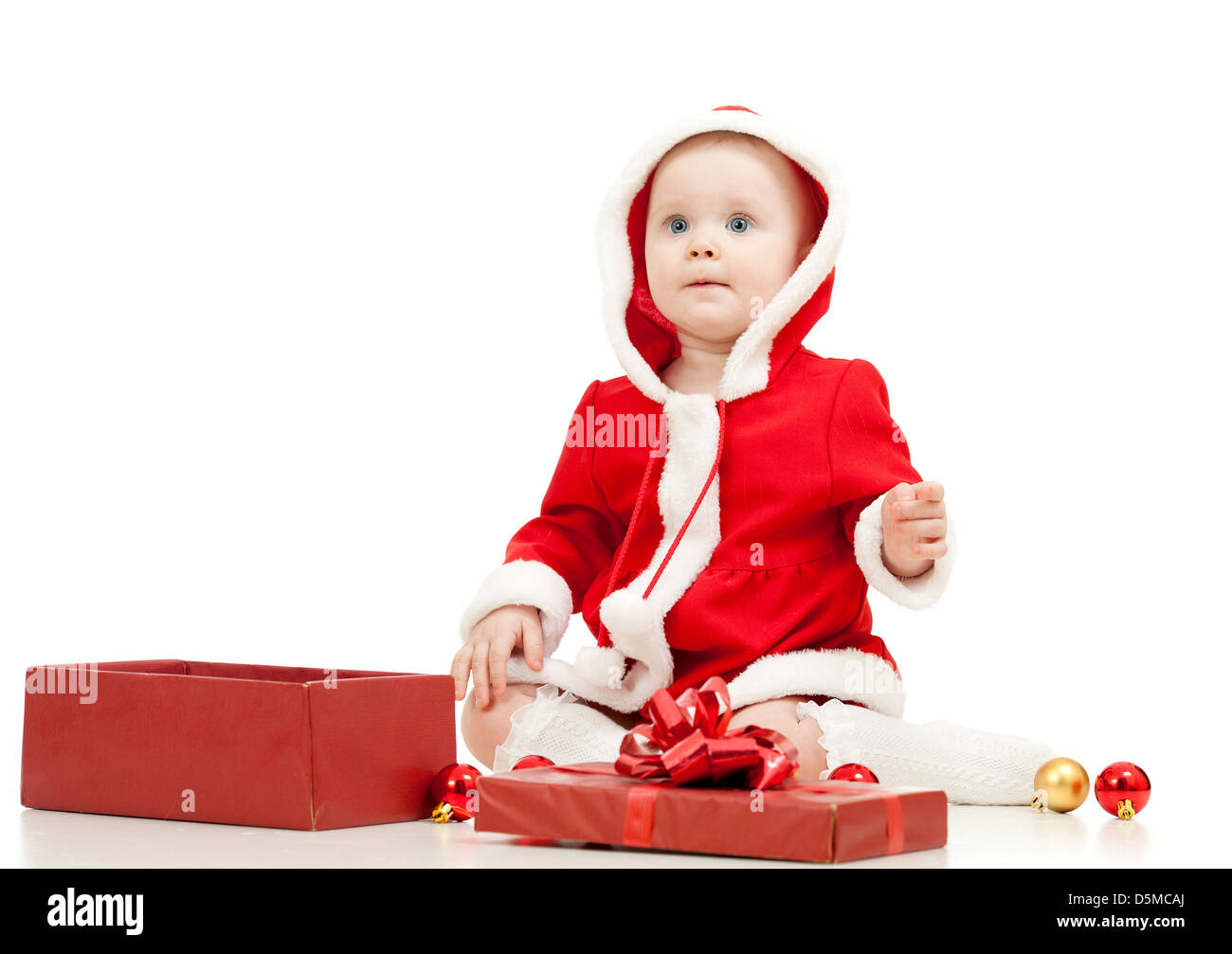 Santa Claus baby with gift box isolated on white background Stock Photo