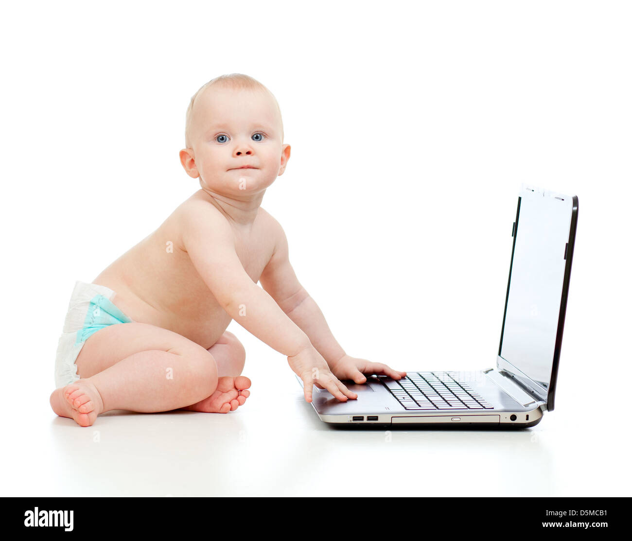 Child using a laptop Stock Photo Alamy