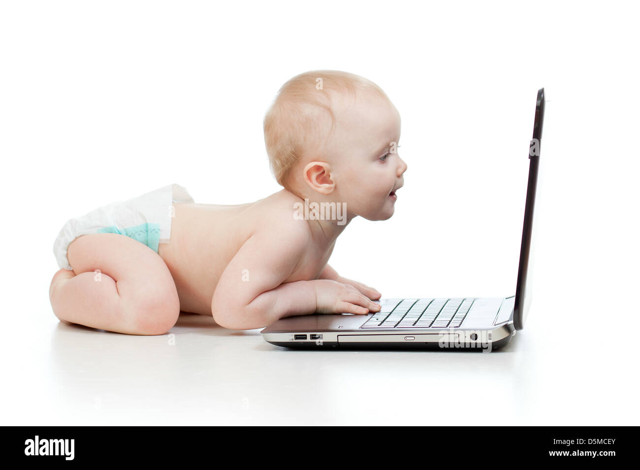 Child using a laptop Stock Photo Alamy