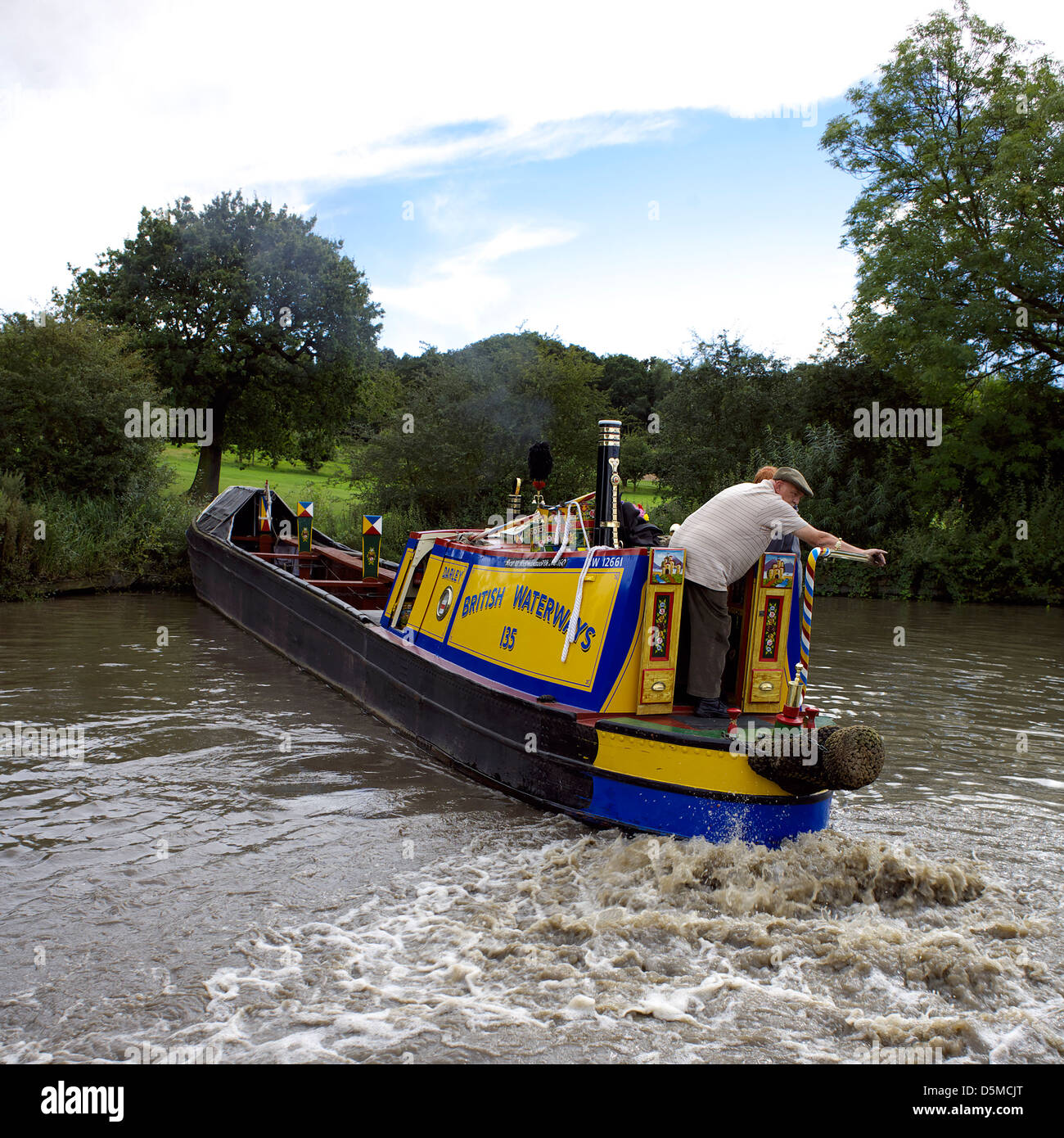British Waterways boat 135 Darley turning at the Alvecote winding hole Coventry Canal during the 2012 Alvecote Historic Boat Stock Photo