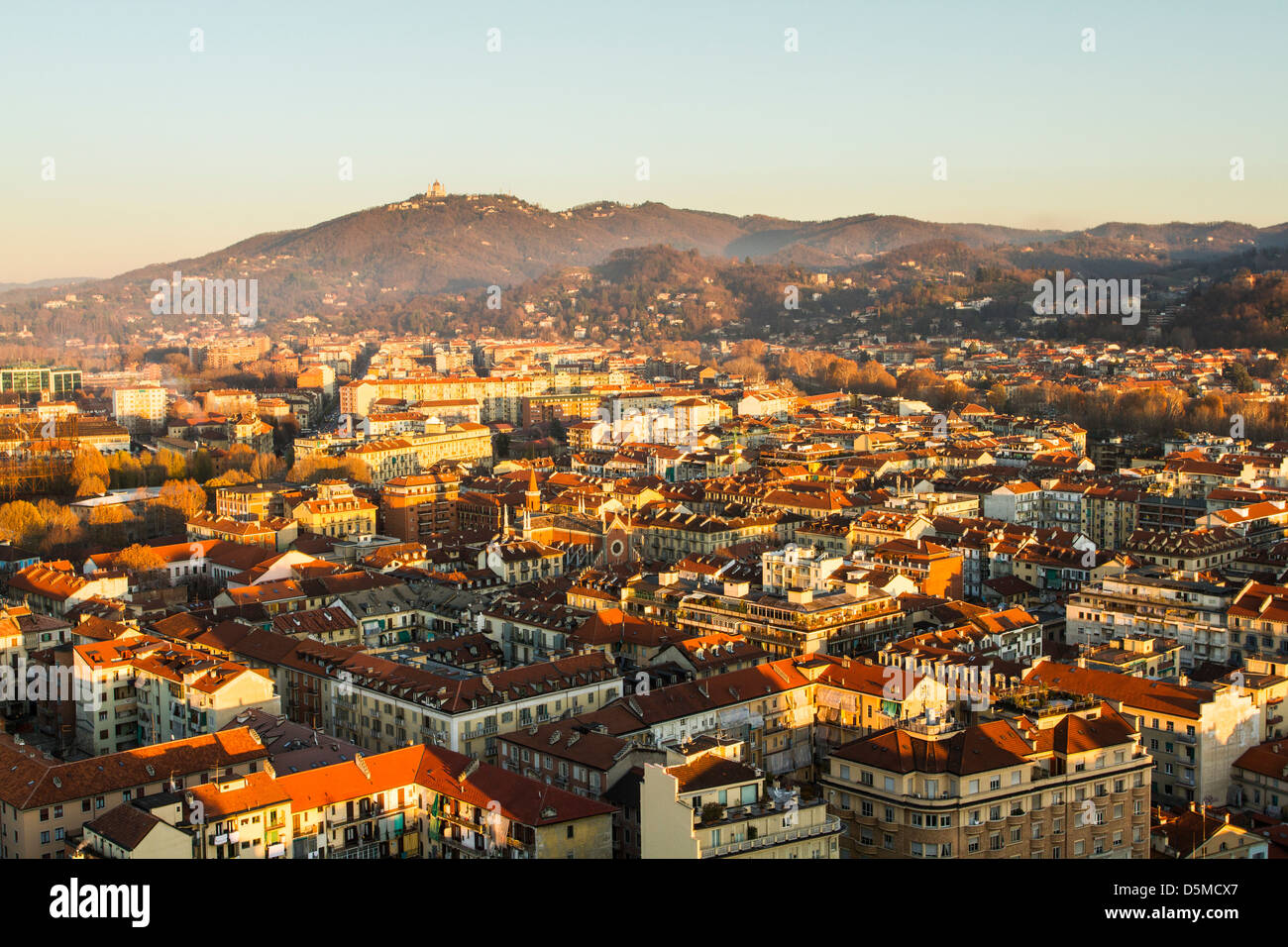 View of the city of Turin from the top of Mole Antonelliana, with the Hill of Superga in the background. Stock Photo