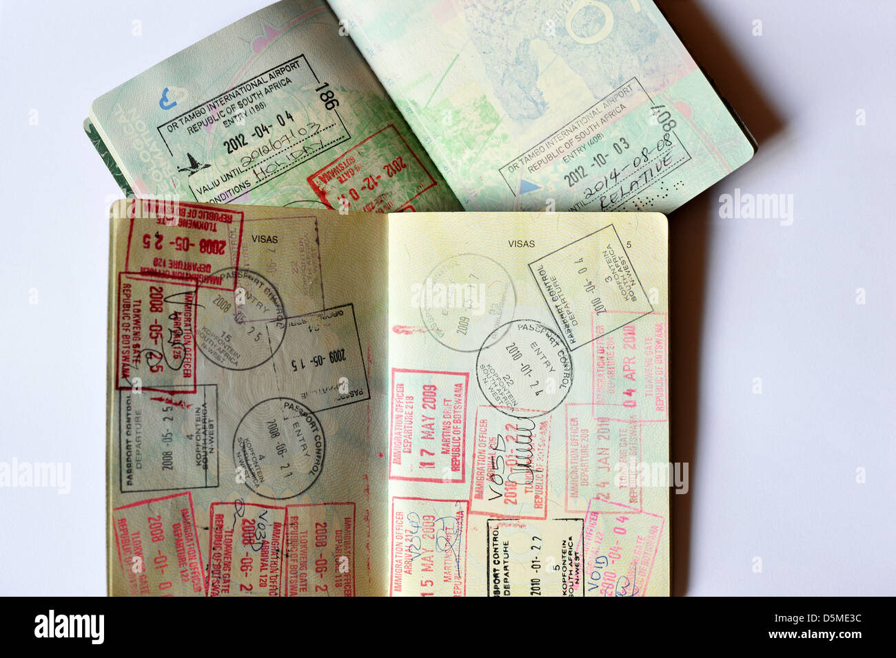 Two Passports with fully used Visa pages stamped full of Visas. Stock Photo