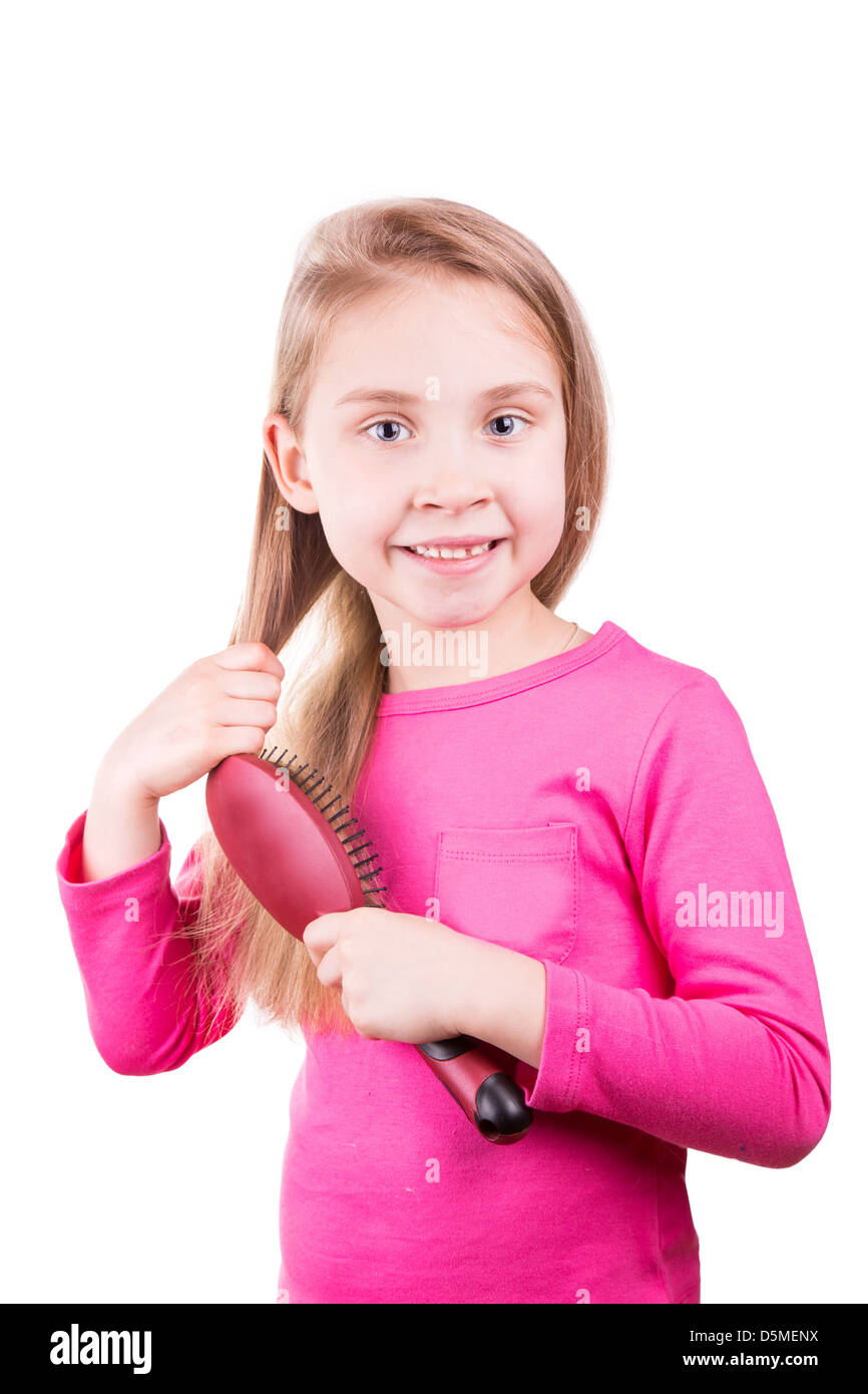 девочка расчесывает волосы. расчесывание волос. расческа для детей. девочка расчесывает волосы. для детских волос для расчесывания.