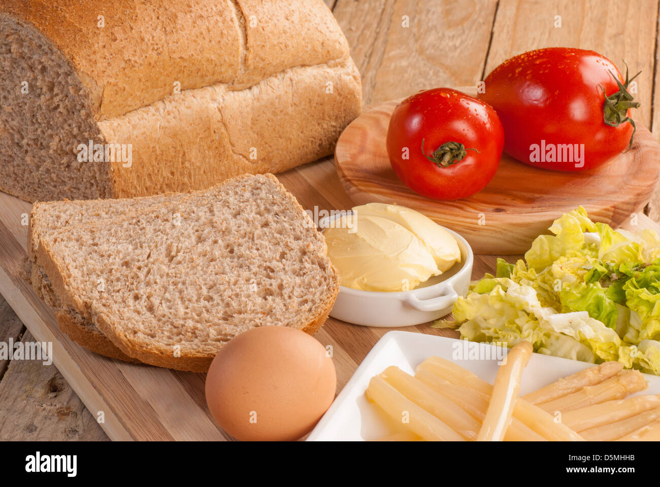 Preparing a vegetarian sandwich with whole wheat bread Stock Photo Alamy