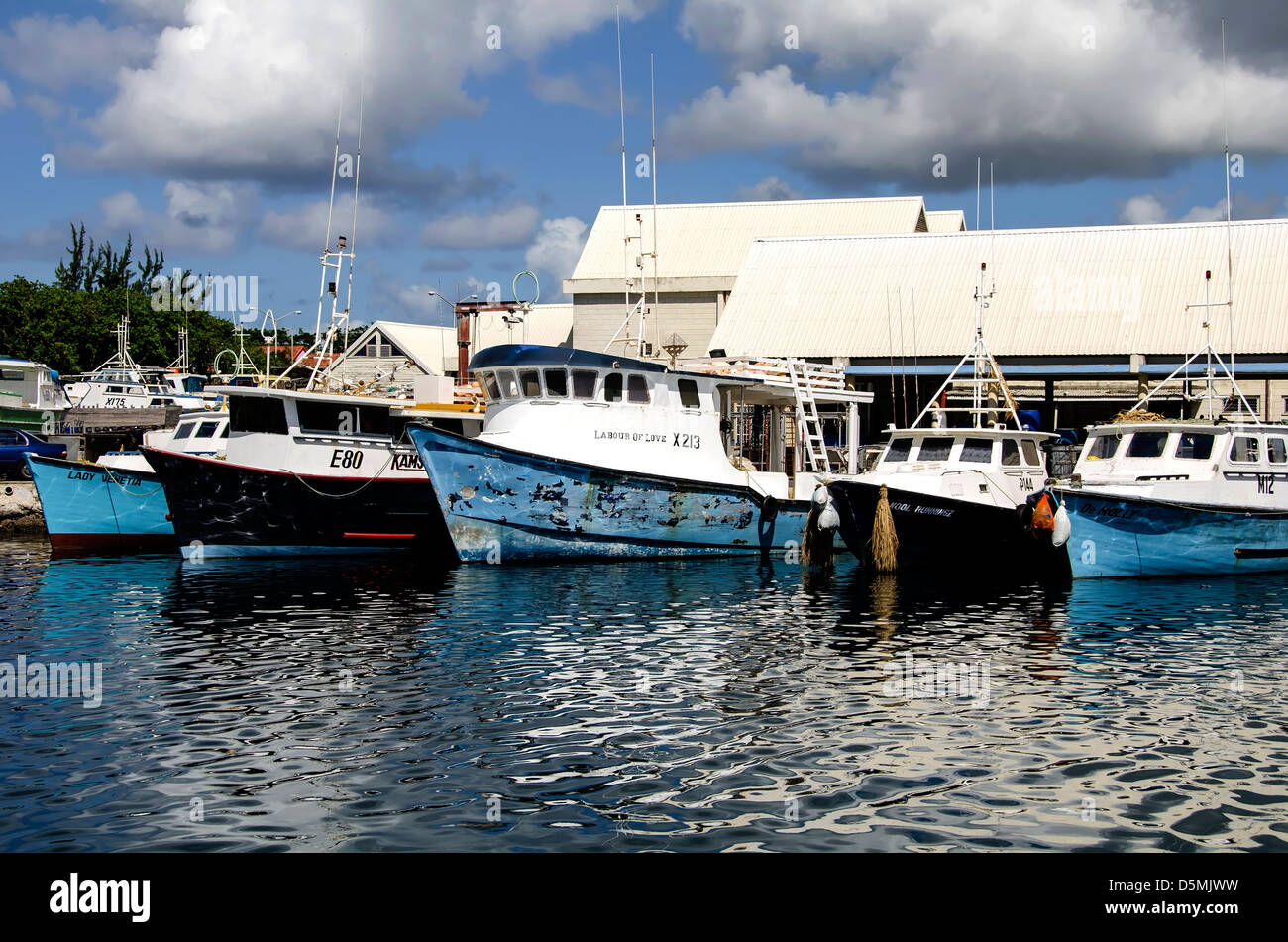 Traditional wood commercial fishing boats anchored at Fishing Harbour, Bridgetown, Barbados Stock Photo