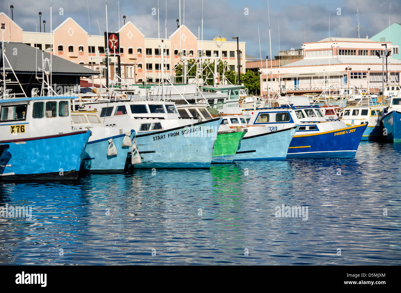 Traditional  wood commercial fishing boats anchored at Fishing Harbour, Bridgetown, Barbados Stock Photo