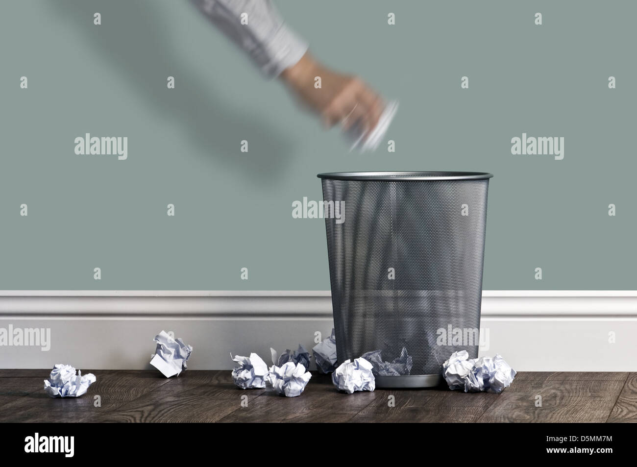 office garbage near metal basket Stock Photo