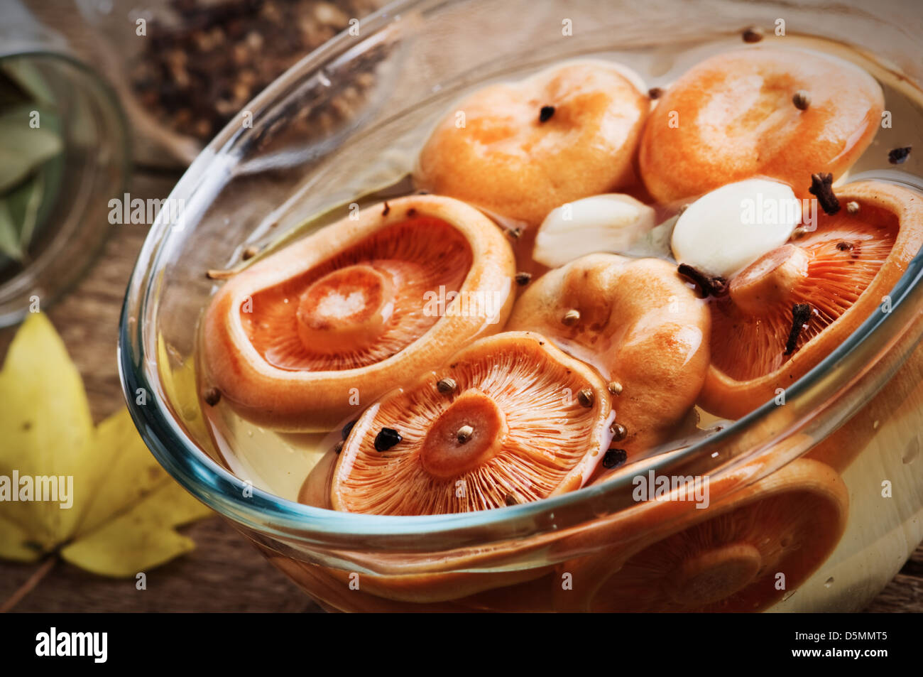 pickled mushrooms on glass bowl closeup Stock Photo