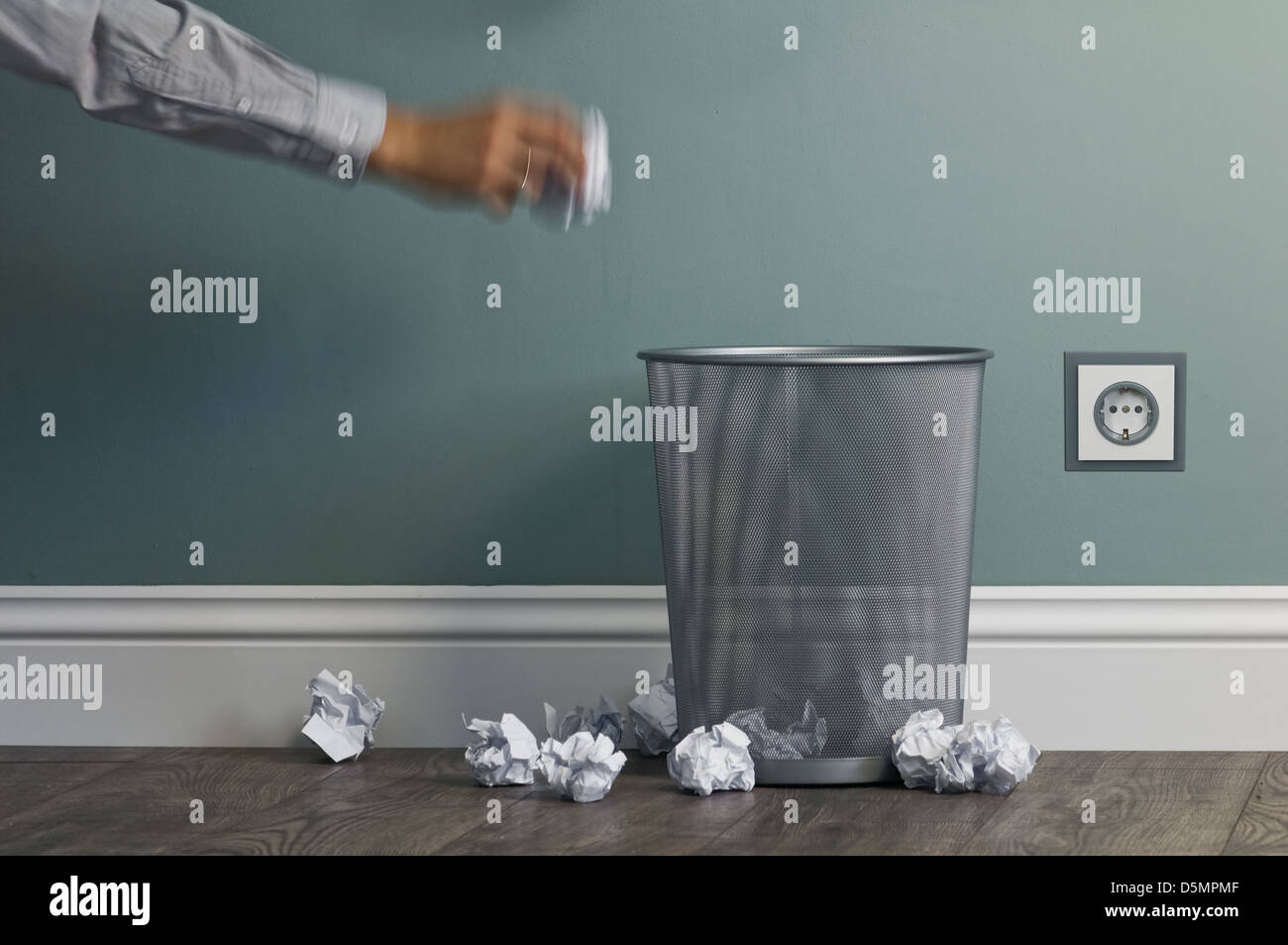 office garbage near metal basket Stock Photo Alamy