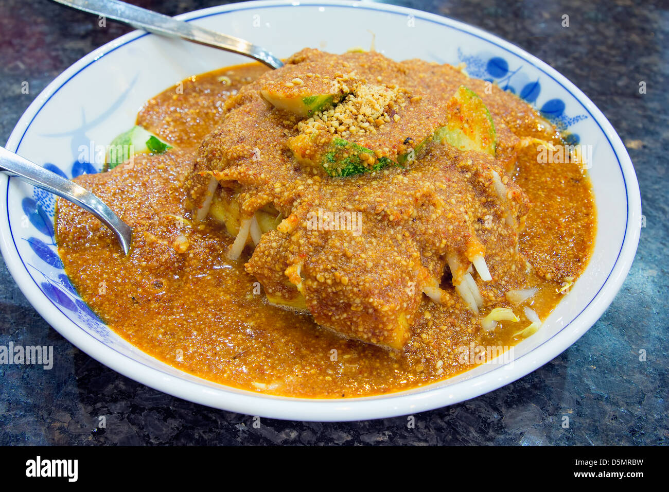 Malay Tauhu Goreng Fried Tofu Dish with Cucumbers Bean Sprouts Covered with Peanut Gravy Sauce Closeup Stock Photo