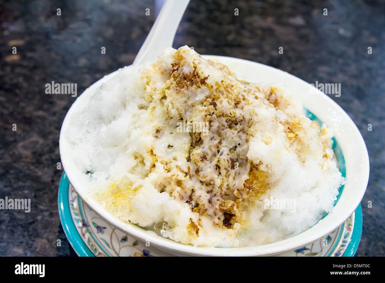 Cendol Shaved Ice Dessert with Gula Melaka Sugar Syrup and Coconut Milk Stock Photo