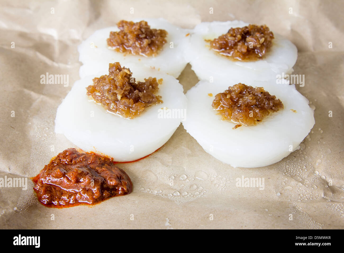 Singapore Chwee Kueh Steamed Water Rice Cake with Preserved Turnip and Chili Paste Closeup Stock Photo