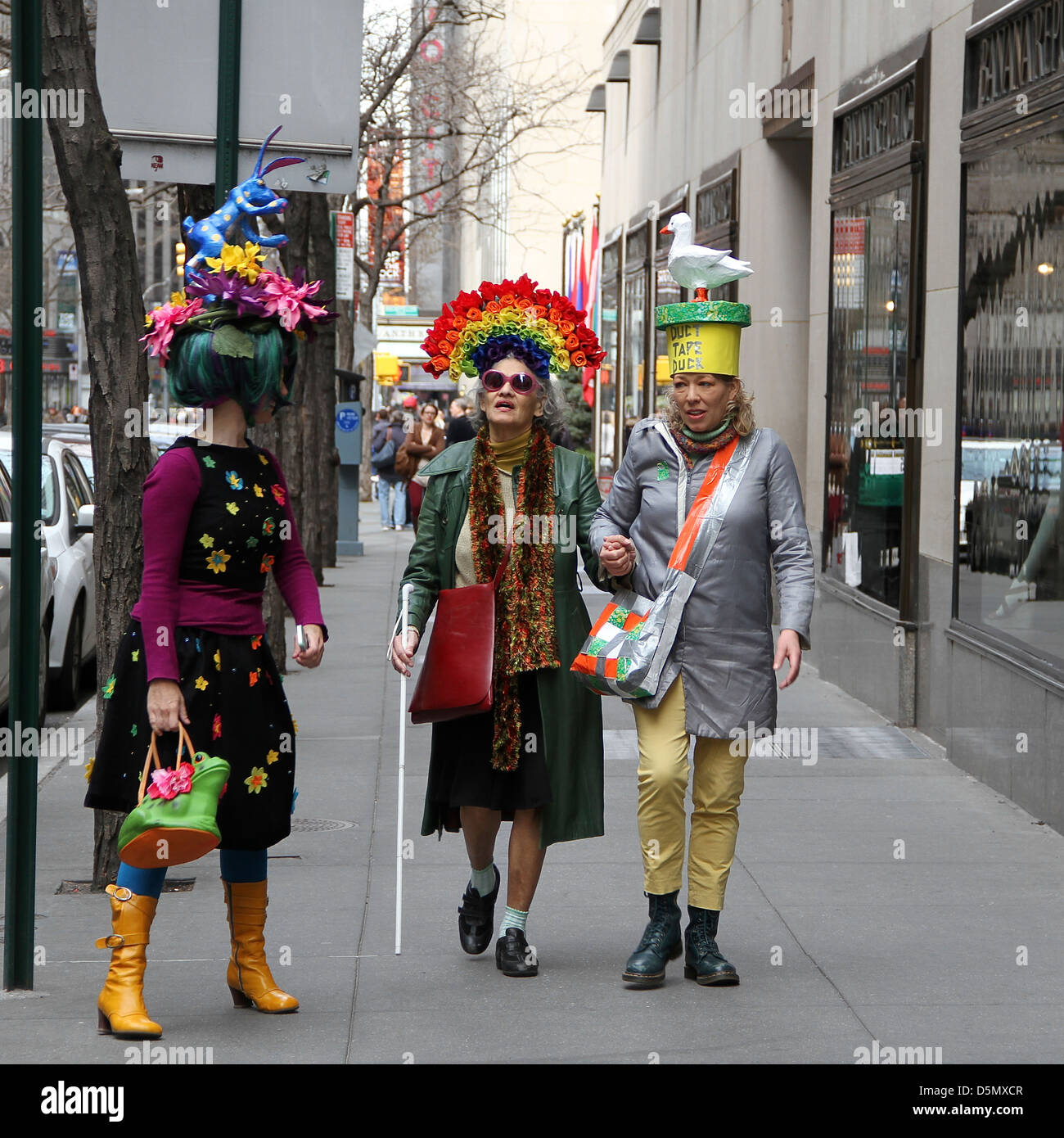 Three women participating in New York City's Easter Parade Stock Photo