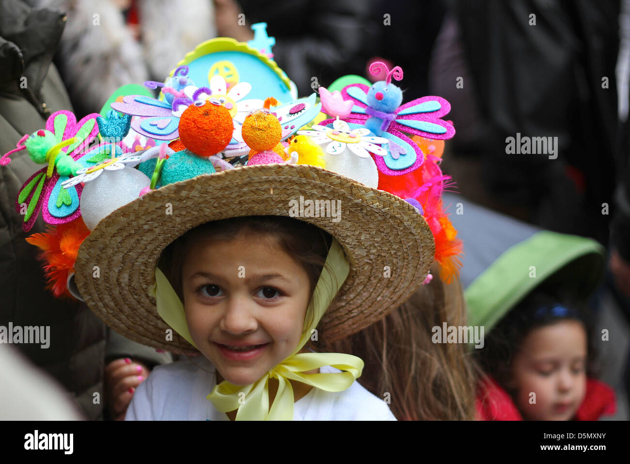 A little girl in a big hat at New York City's Easter Parade Stock Photo