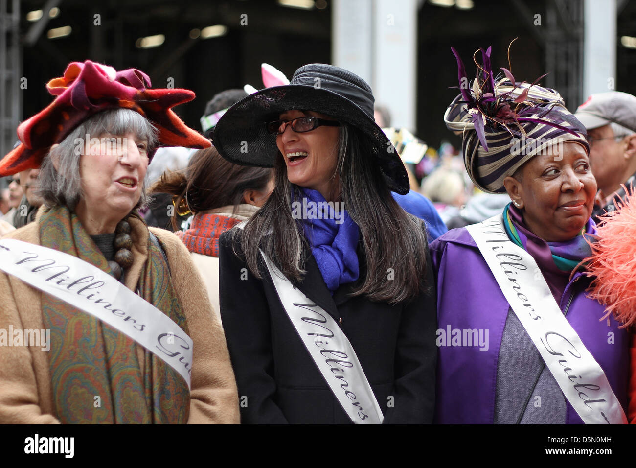 Women wearing Milliners Guild sashes at New York City's Easter Parade Stock Photo