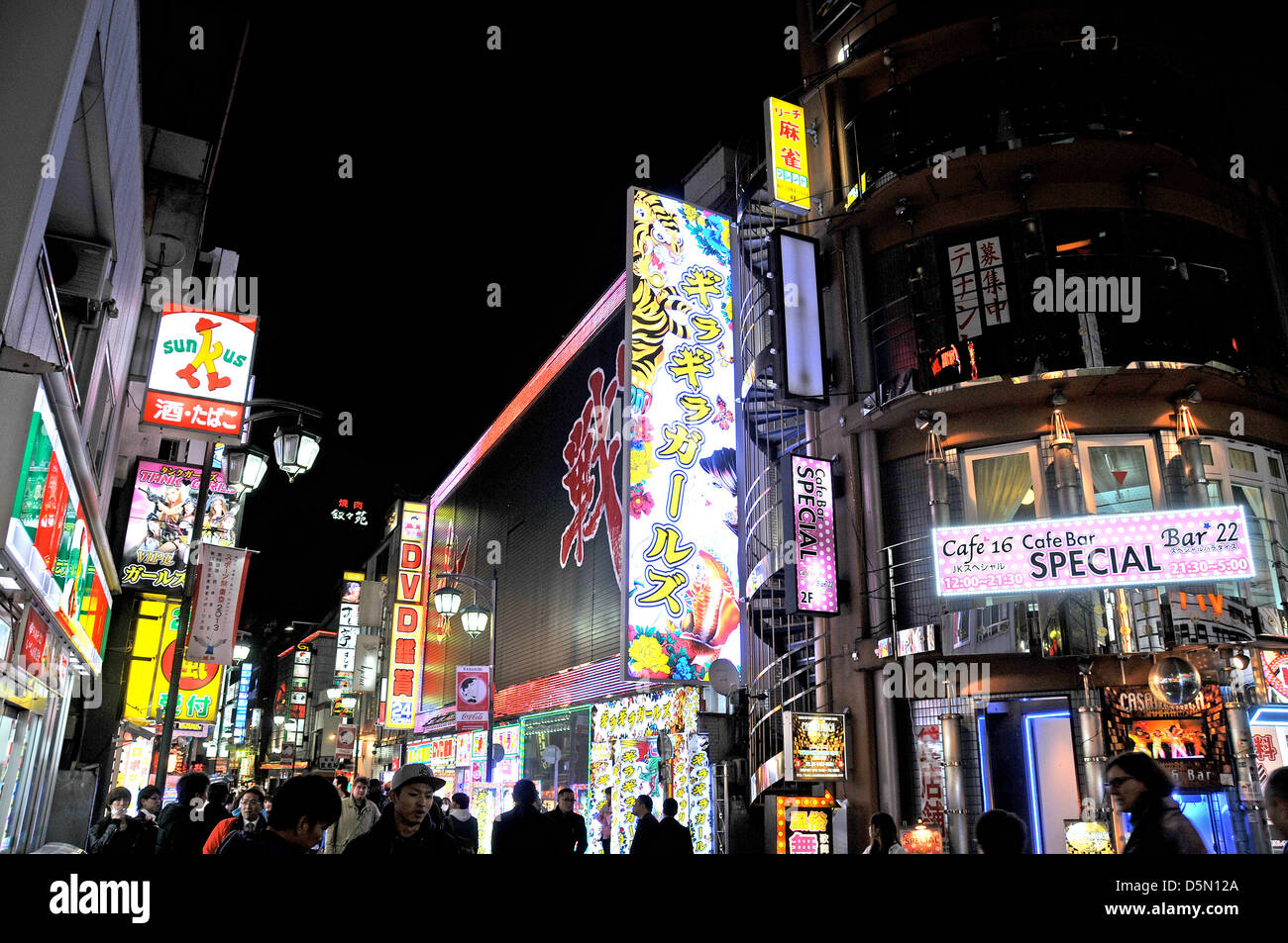 street scene by night Kabukicho Shinjuku Tokyo Japan Stock Photo