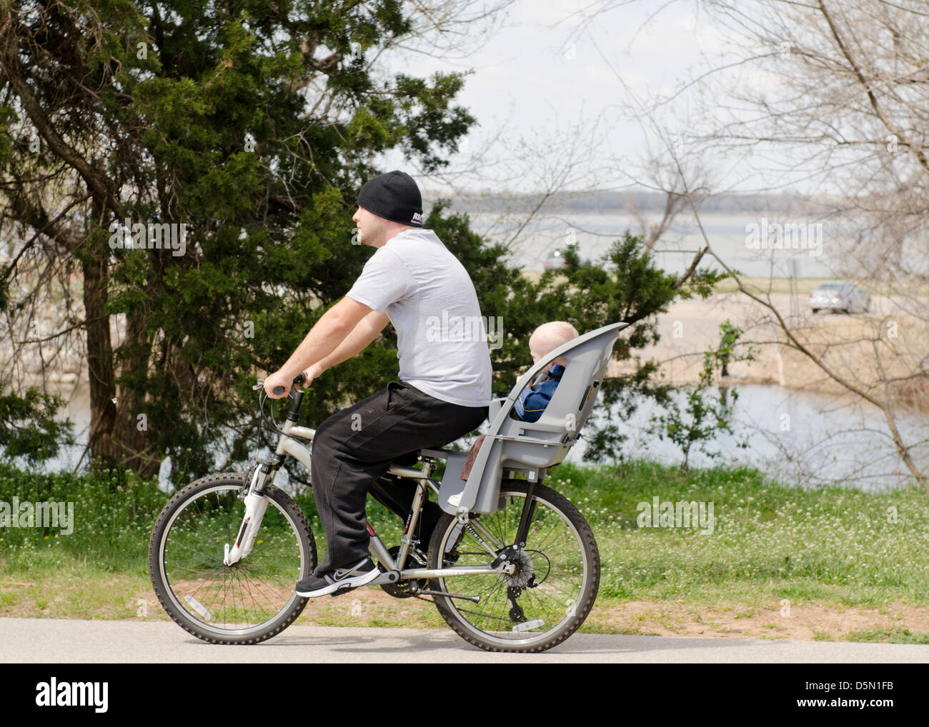 riding bike with baby in carrier