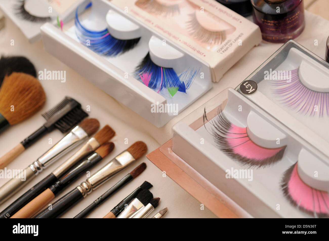 false eyelash and brush makeup Stock Photo