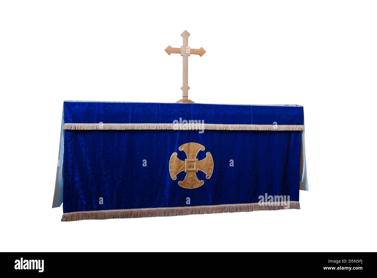 Church Altar With Cloth Candles and A Cross Stock Photo