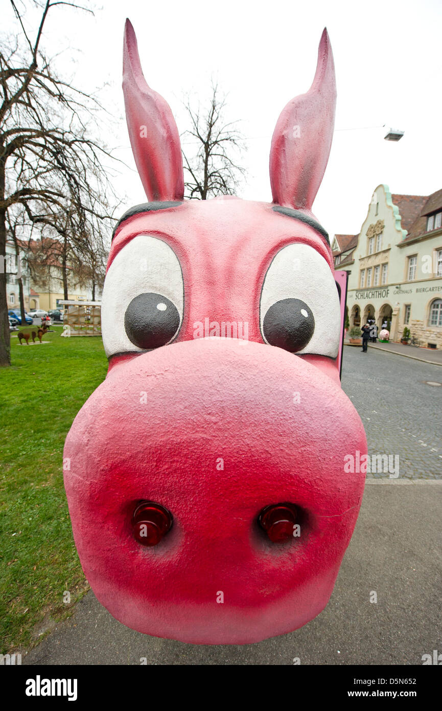 Stuttgart, Germany. 5th April 2013. Former tram 'Säu'li Tram' is featured at the Pig Museum in Stuttgart. The tram built in 1961 in Switzerland is the largest exhibit of the museum. Credit: CHRISTOPH SCHMIDT/DPA/Alamy Live News Stock Photo