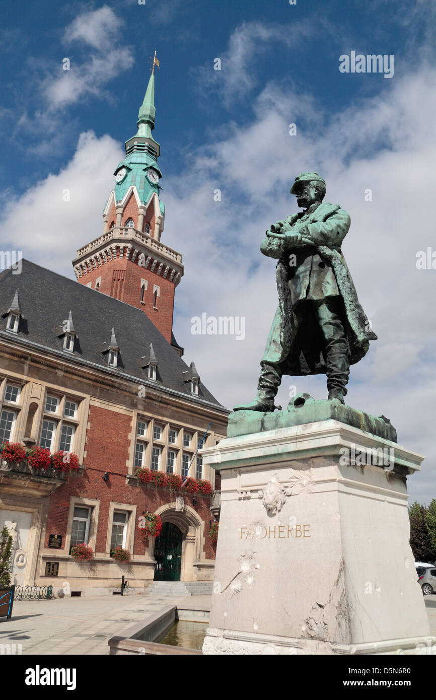 Statue of Louis Faidherbe with the Mairie (Town Hall) behind, Place de l'Hôtel-de-ville, Bapaume, Pas-de-Calais, France. Stock Photo