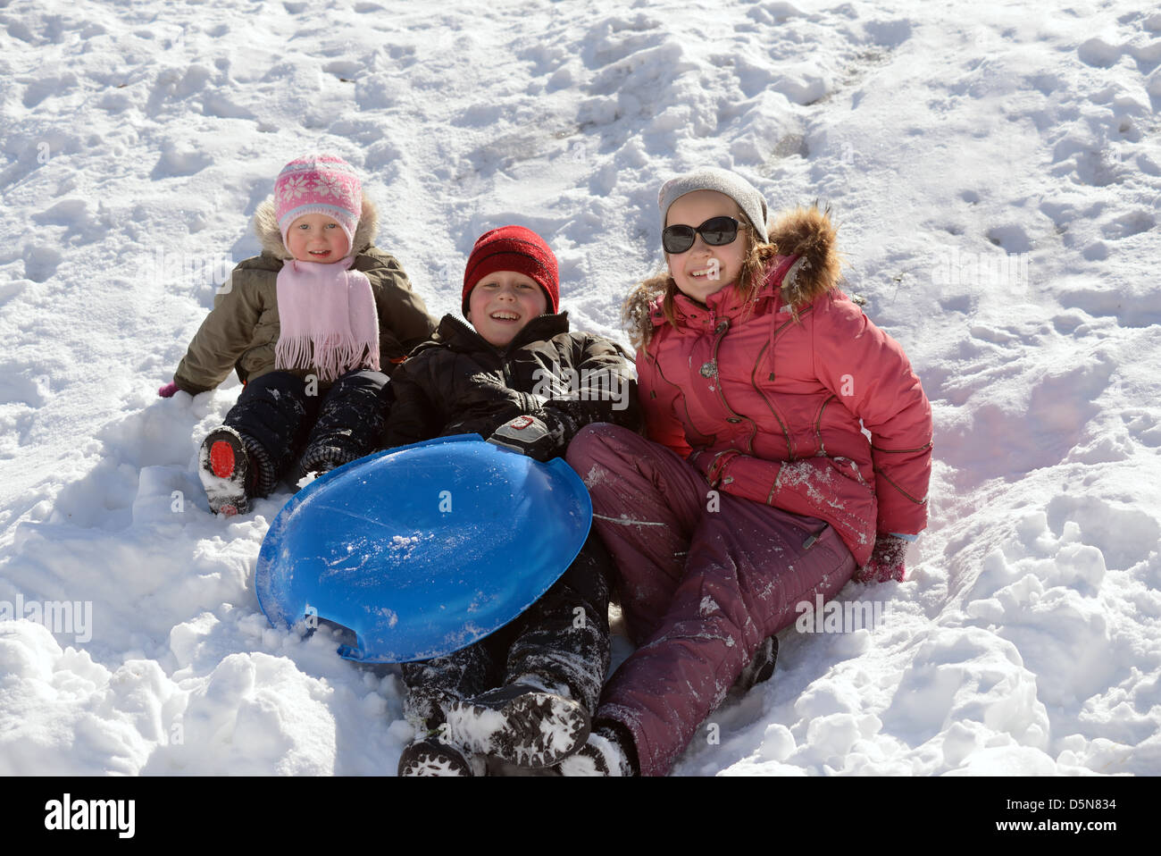 children playing in snow Stock Photo
