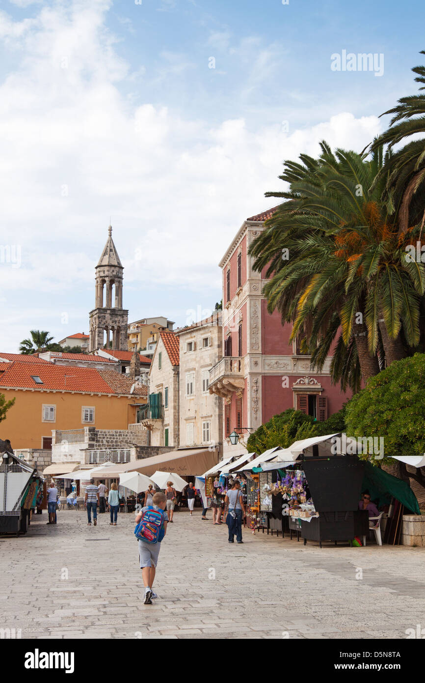 Local people and tourists shopping in a market in Hvar town on Hvar island in Croatia Stock Photo