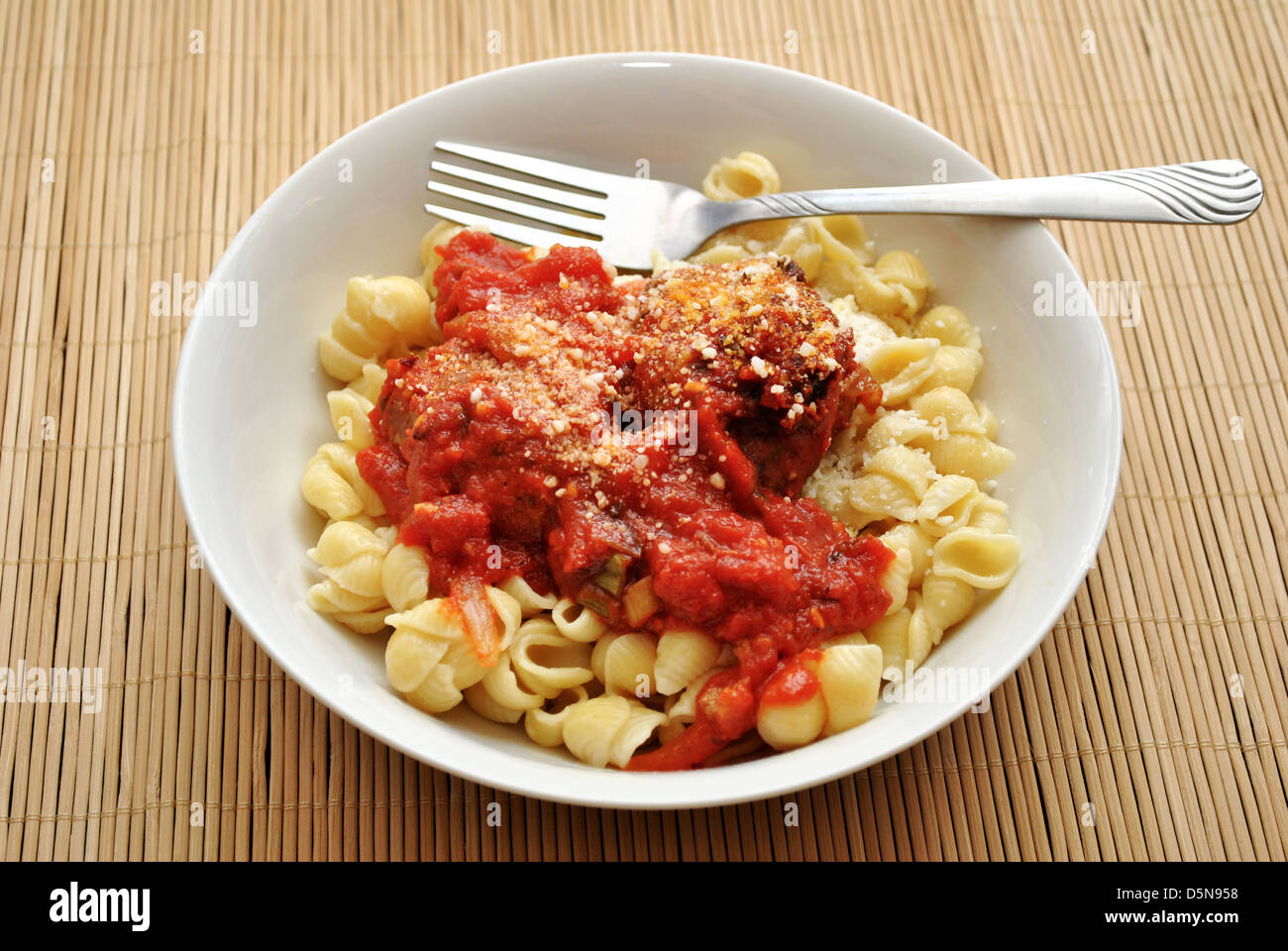 Eating a Tasty Italian Pasta Dinner Stock Photo - Alamy