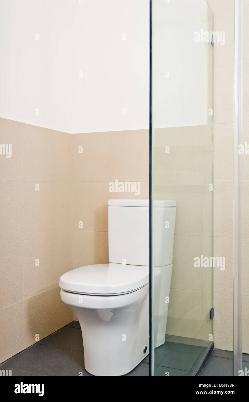White ceramic toilet bowl of a brand new bathroom Stock Photo - Alamy