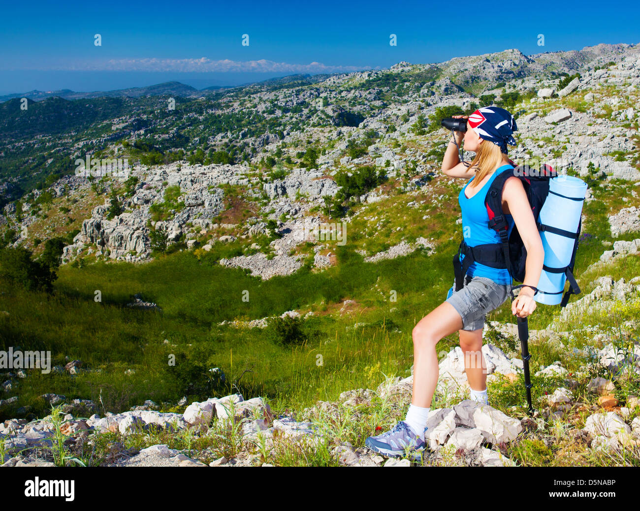 Woman mountain top binocular hi-res stock photography and images - Alamy