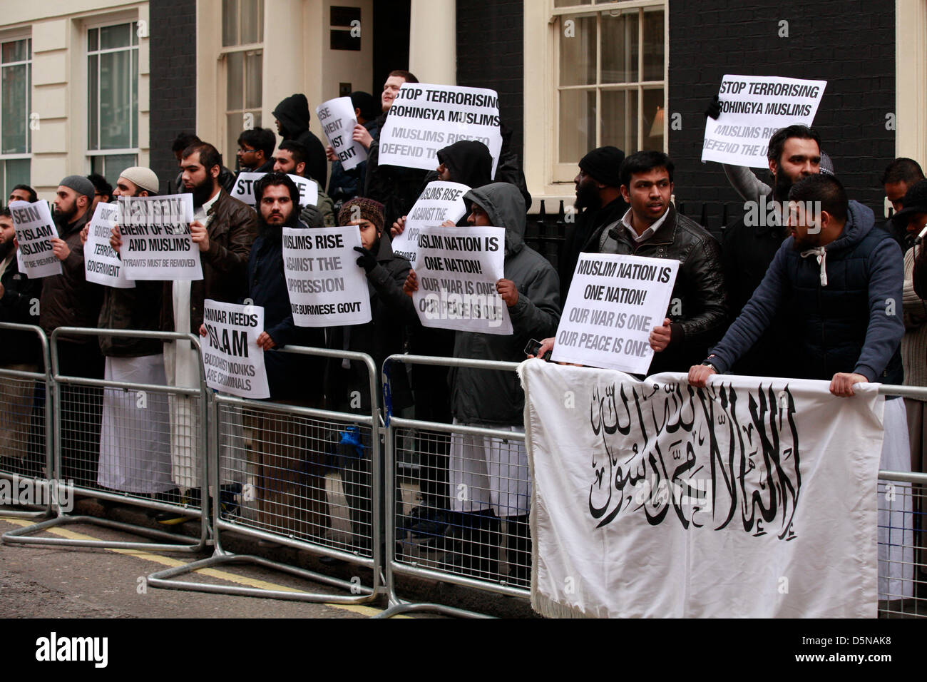 LONDON, 5 April 2013. Muslim demonstration against Burmese and Sri Lankan aggression took place at Hyde Park Gardens (Sri Lanka Embassy) and Charles Street (Burmese Embassy).Women men and children were present at both protests holding placards and singing along. Stock Photo