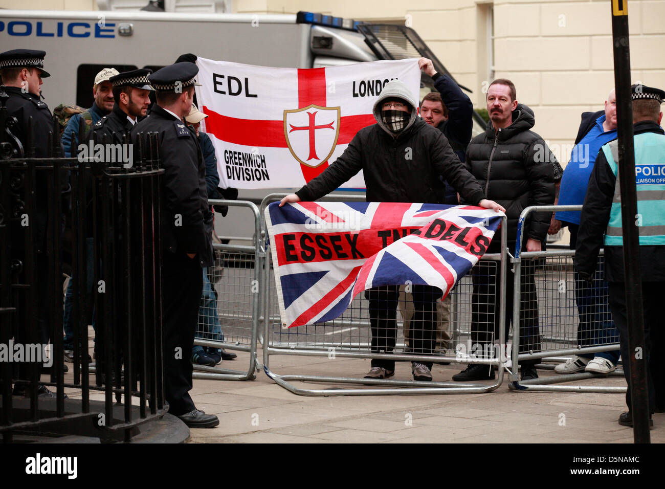 LONDON, 5 April 2013. Muslim demonstration against Burmese and Sri Lankan aggression took place at Hyde Park Gardens (Sri Lanka Embassy) and Charles Street (Burmese Embassy). Members of the EDL showed up at both protests chanting slogans against them while also engaging in verbal fight with the protesters. Stock Photo