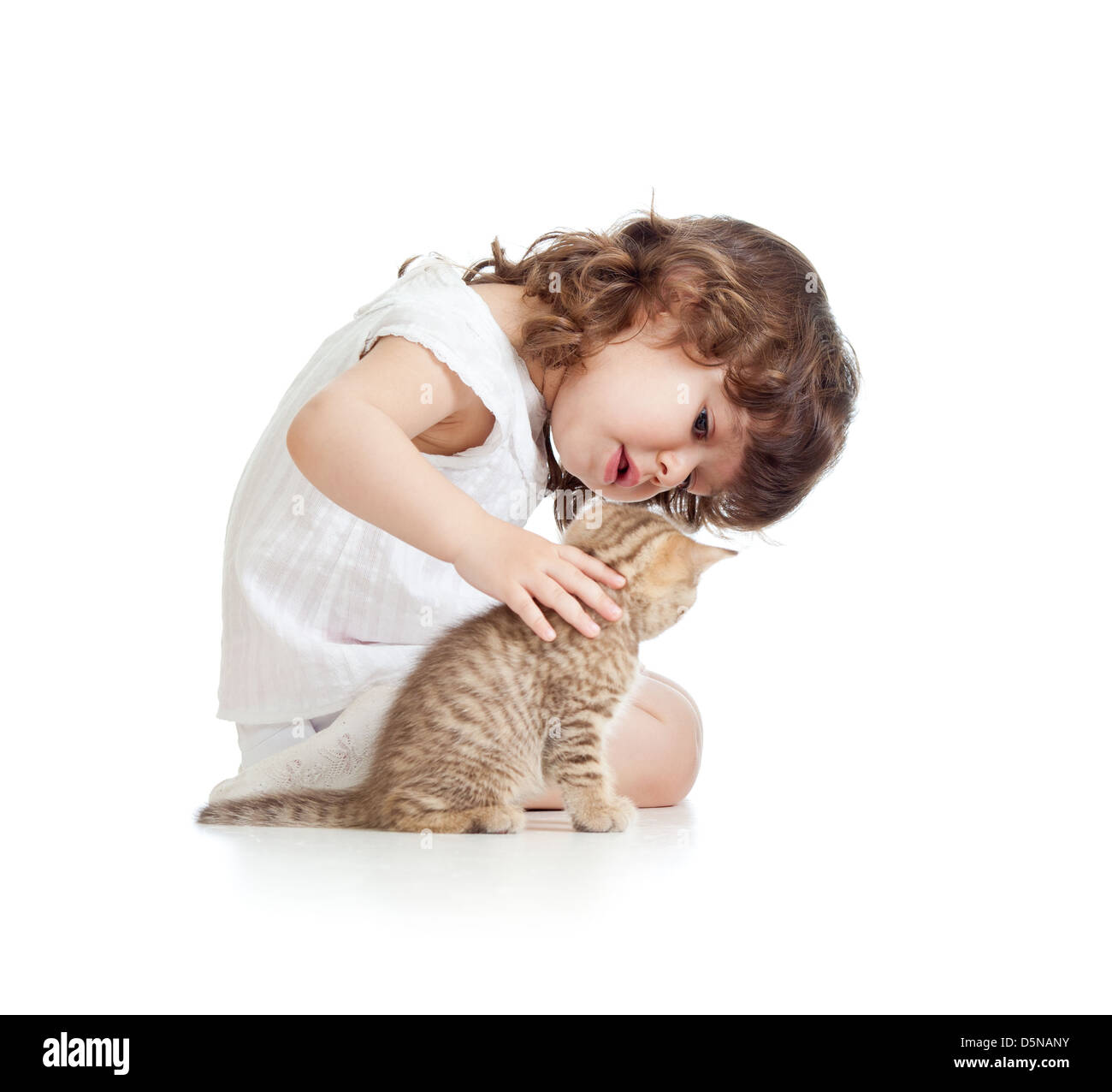 Funny kid girl playing with cat kitten Stock Photo - Alamy