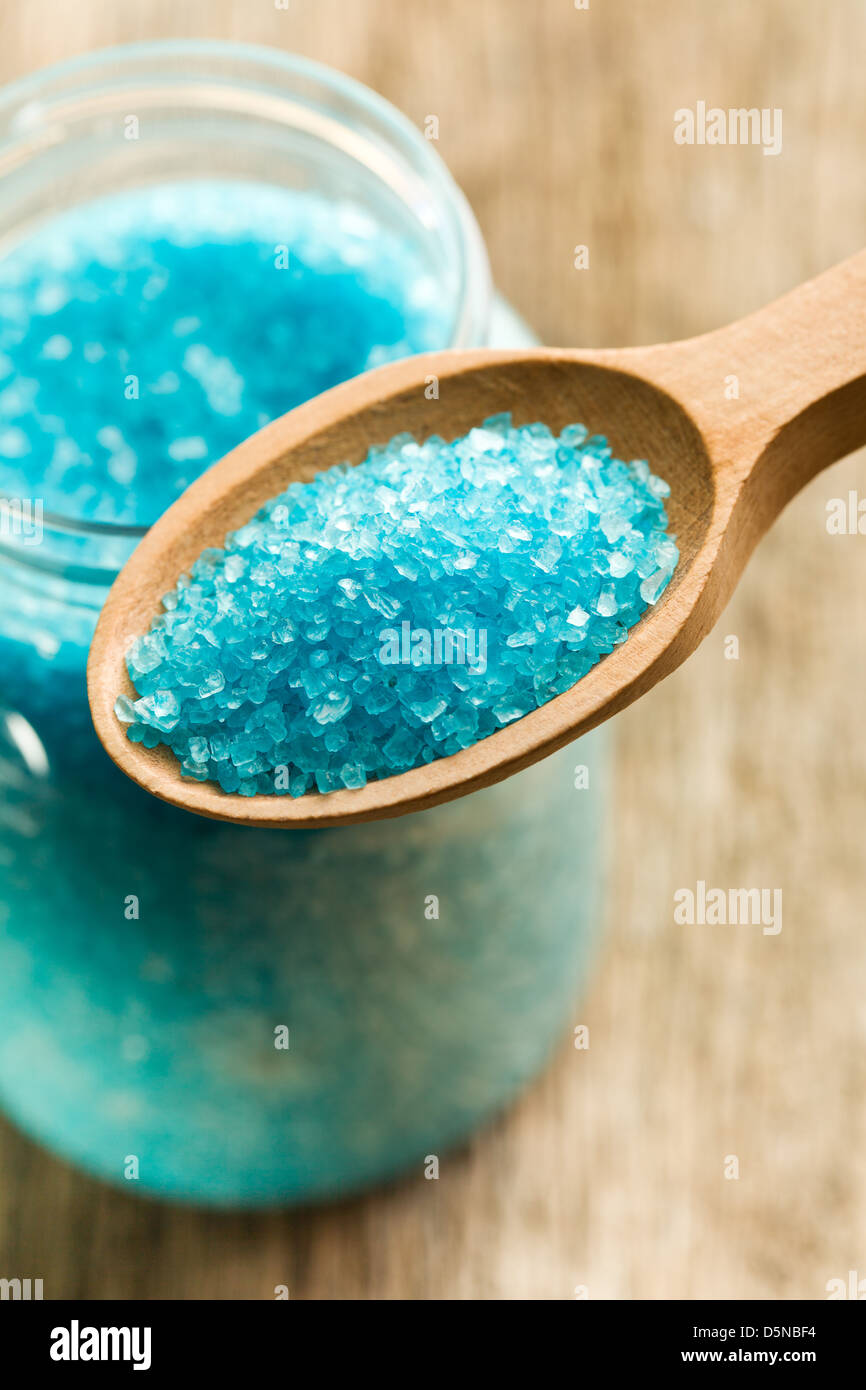 the blue bath salt in wooden spoon Stock Photo