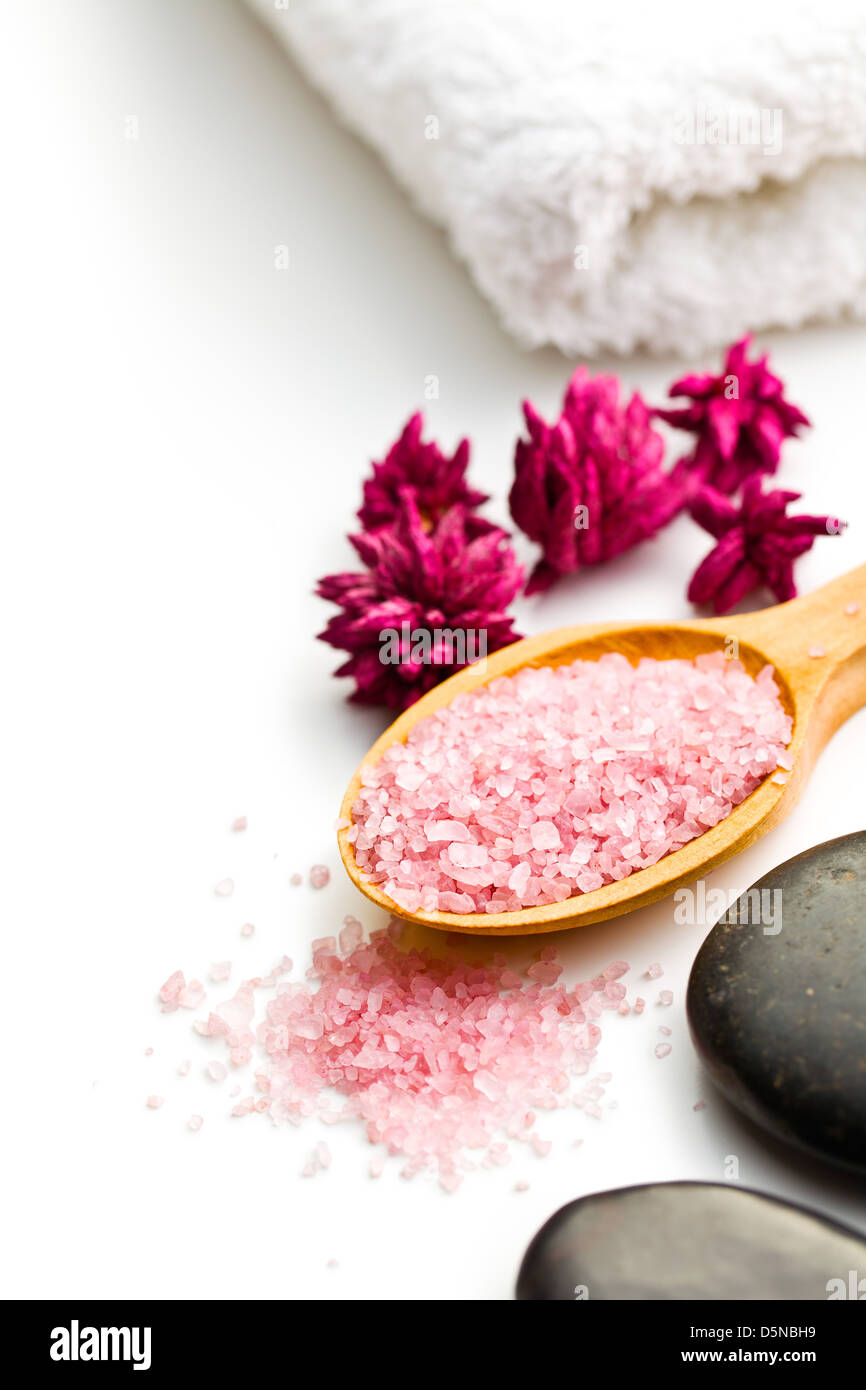 the pink bath salt on wooden spoon Stock Photo