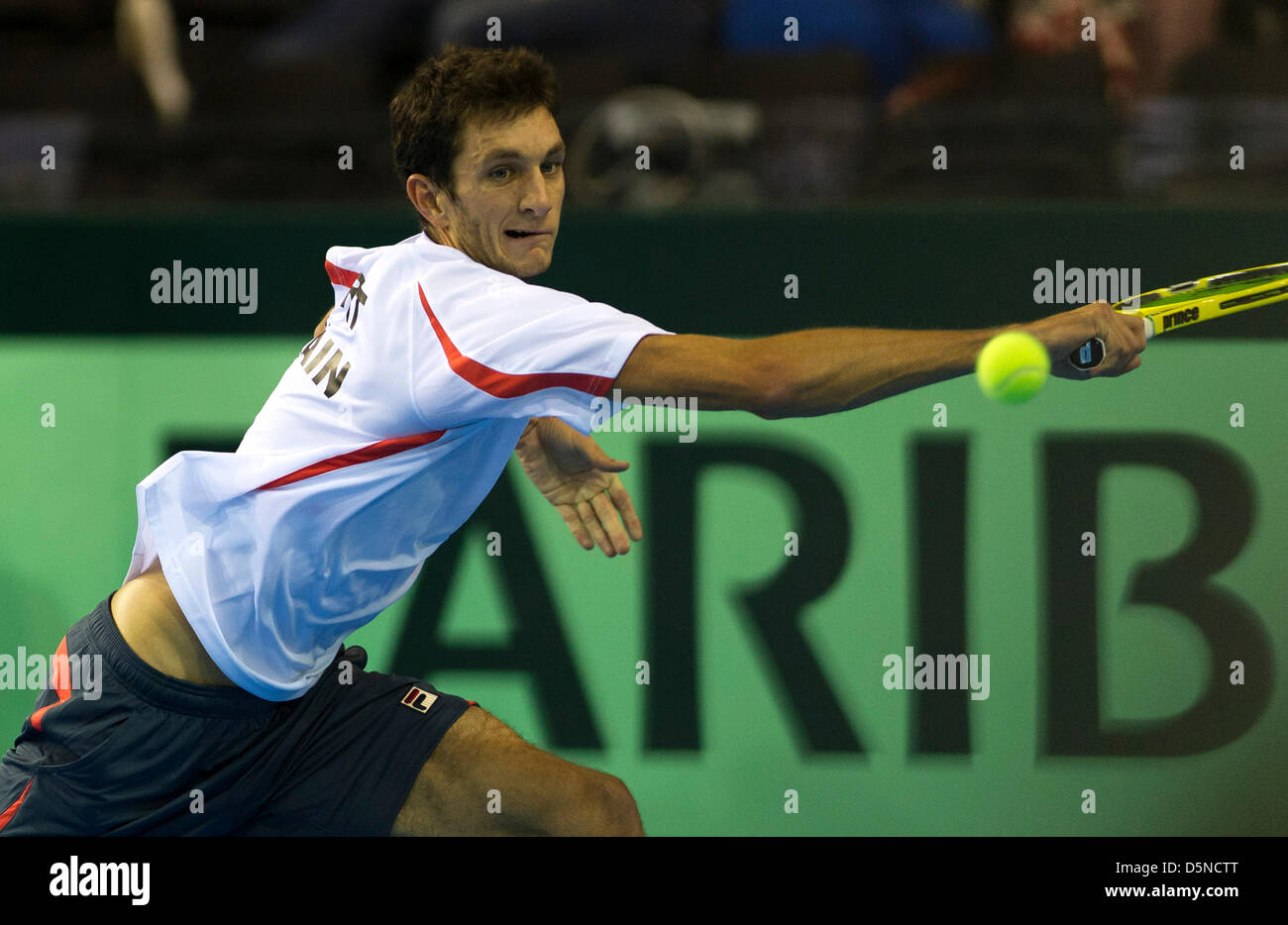 Coventry, UK. 5th April 2013.  Great Britain's James Ward playing against Russia's Evgeny Donskoy during the Euro/Africa Zone Group I Davis Cup tie between Great Britain and Russia from the Ricoh Arena. Credit: Action Plus Sports Images / Alamy Live News Stock Photo