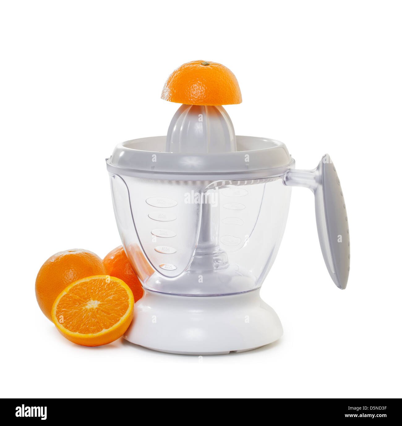 juice extractor with ripe oranges Stock Photo