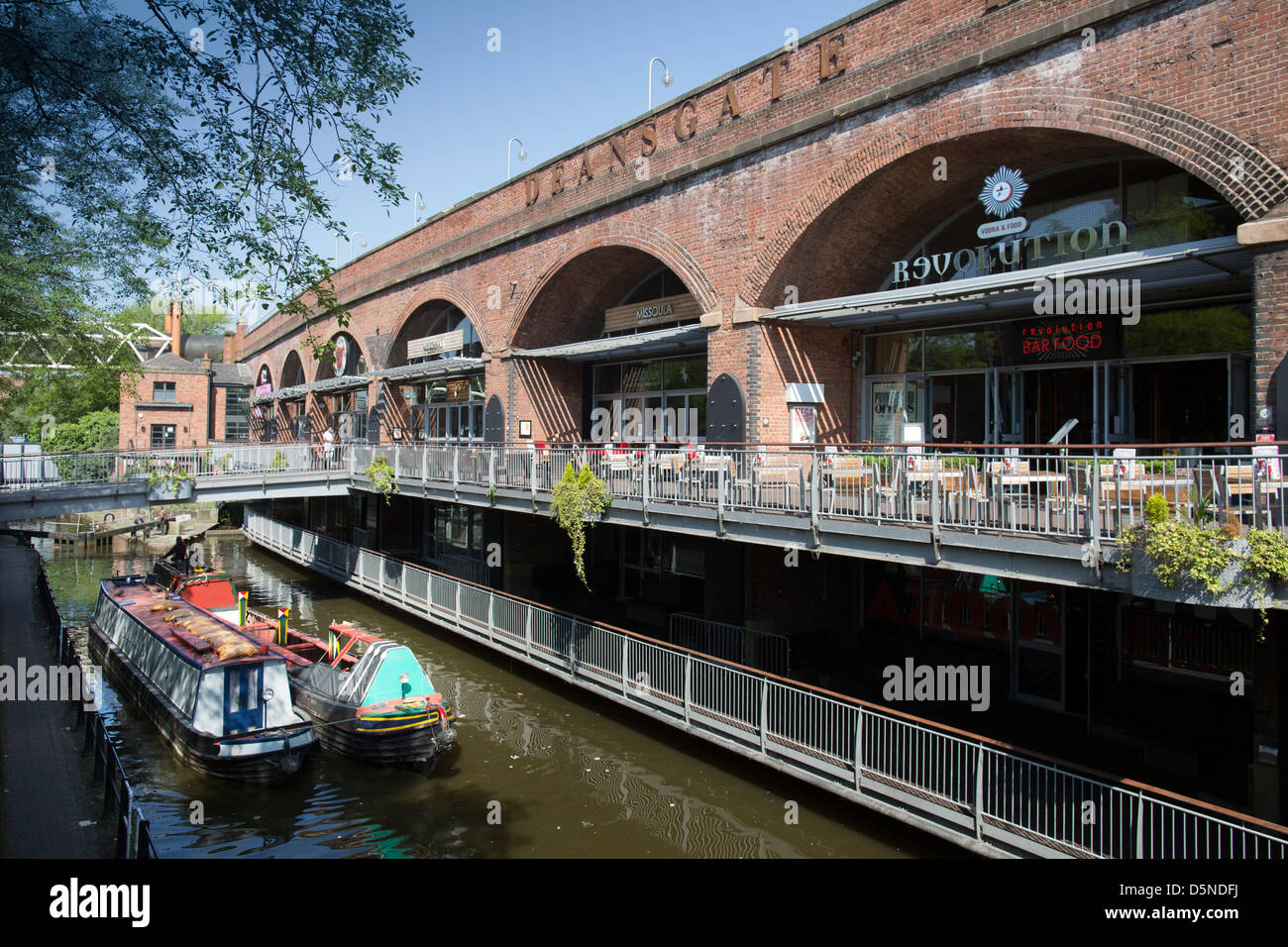 Sunny day at Deansgate locks drinking area in Manchester city centre, England, UK Stock Photo