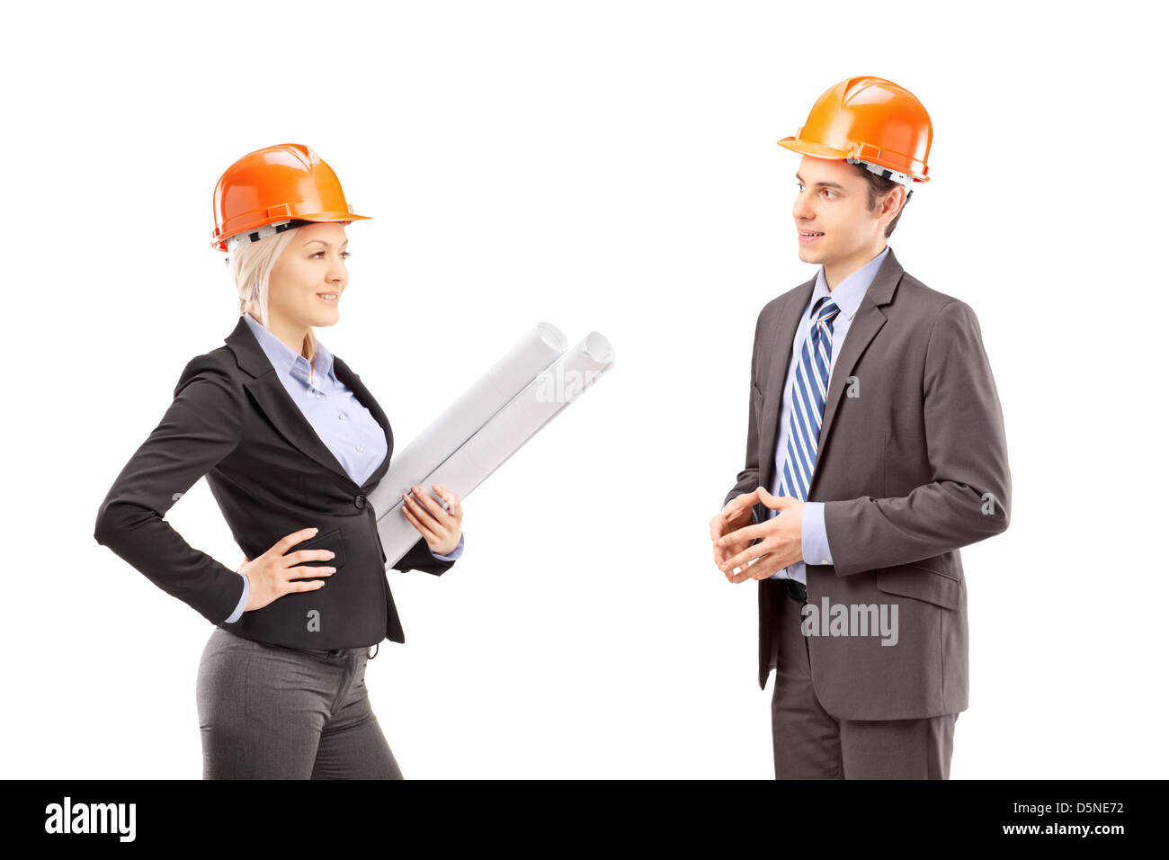 A female architect and male investor having a meeting isolated on white background Stock Photo