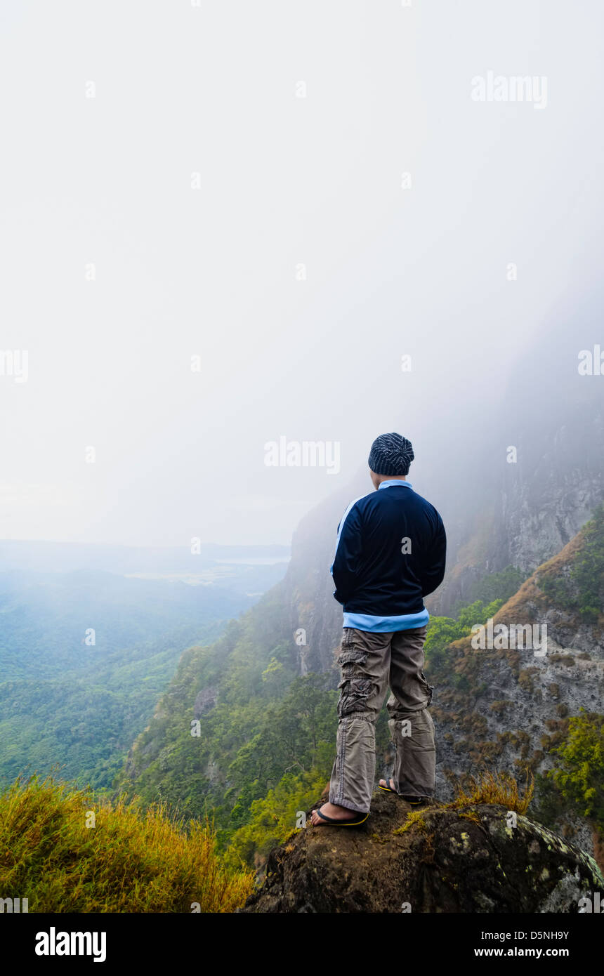 Man standing on mountain foggy hi-res stock photography and images - Alamy