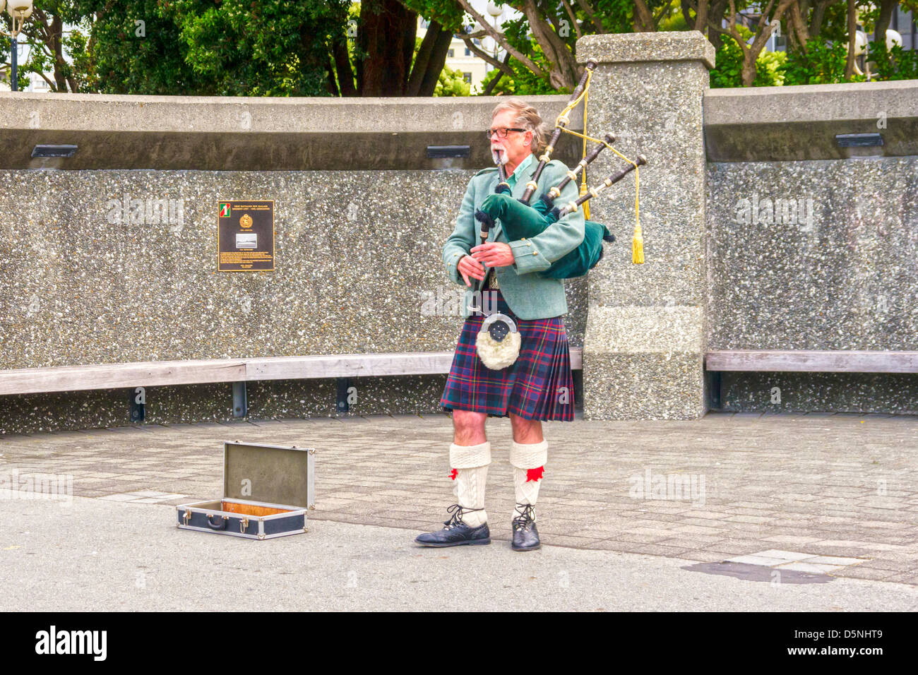 Piper playing bagpipes in Wellington, New Zealand Stock Photo - Alamy