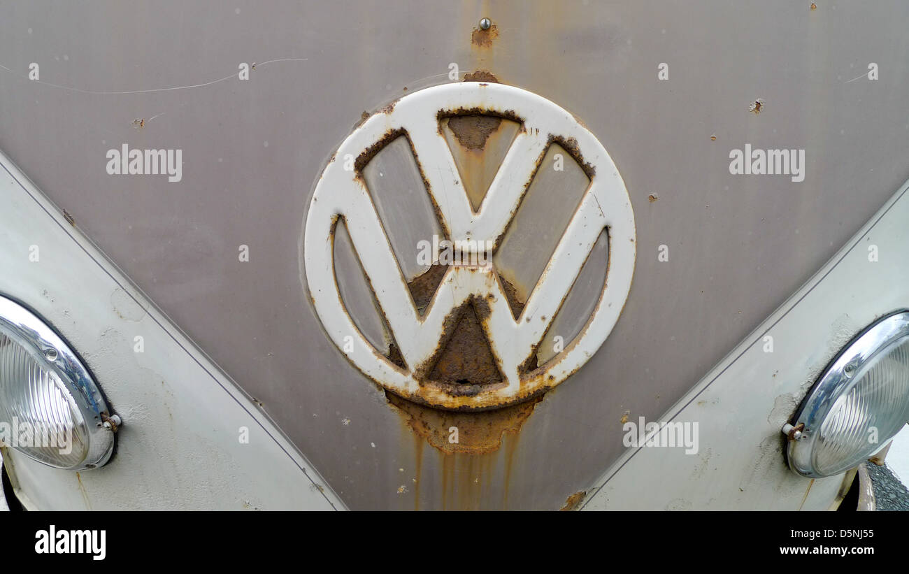 A VW badge on an old Volkswagen van. Stock Photo