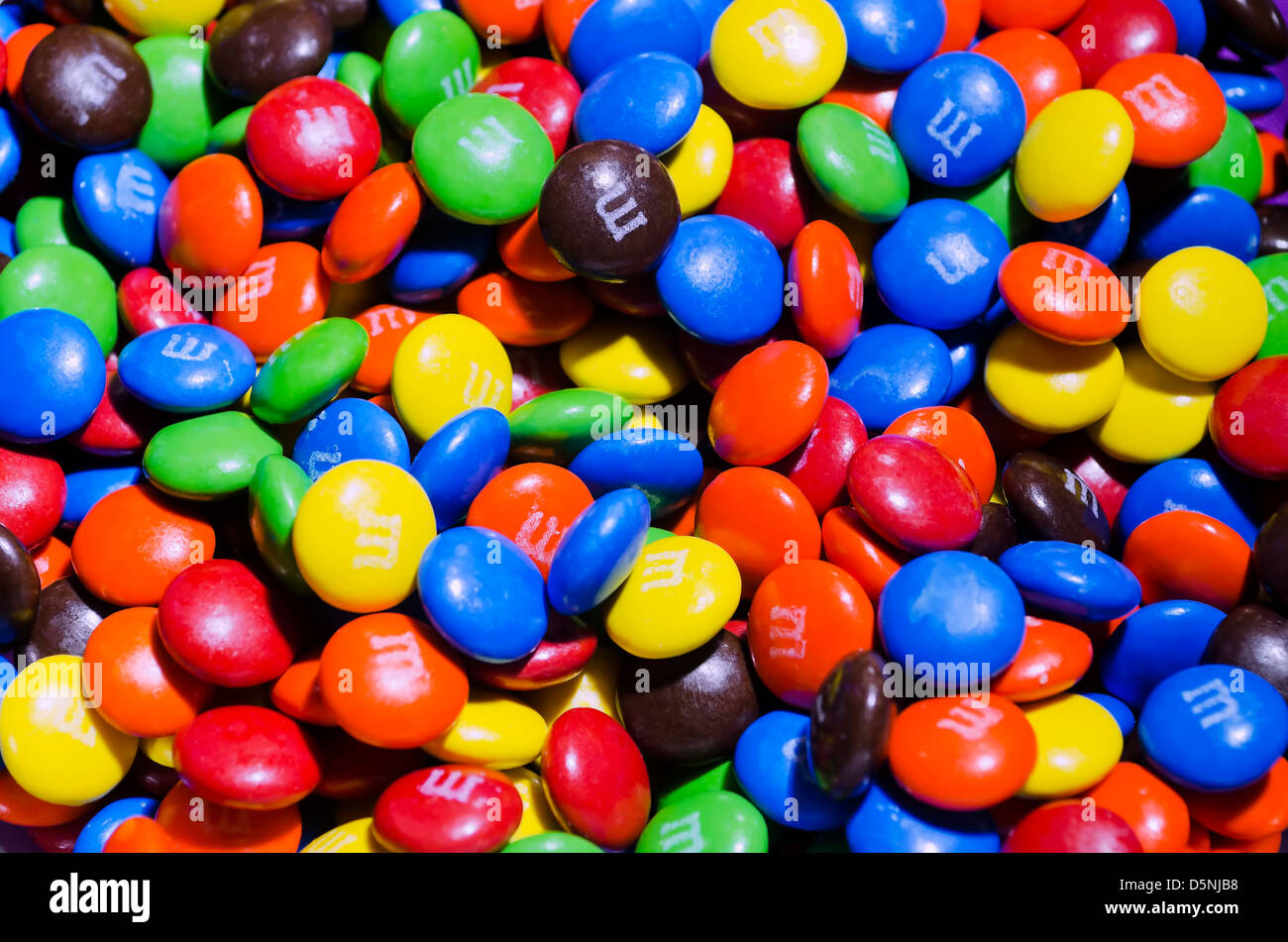 Multicolored M&Ms candies served in a children's party Stock Photo Alamy