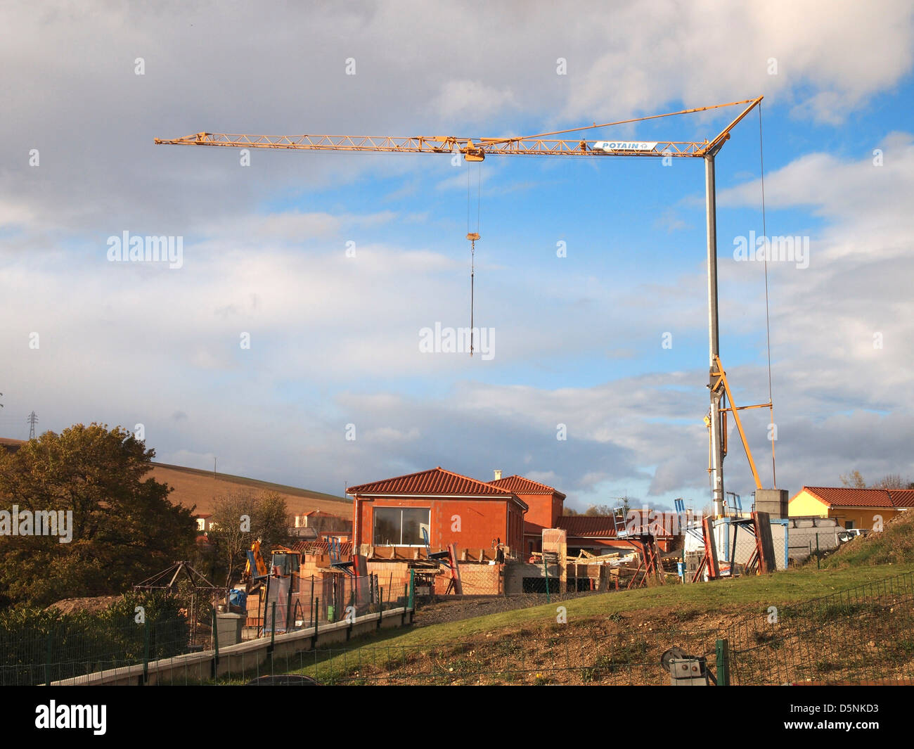 Low angle shot of a construction crane captured on a cloudy Stock Photo ...