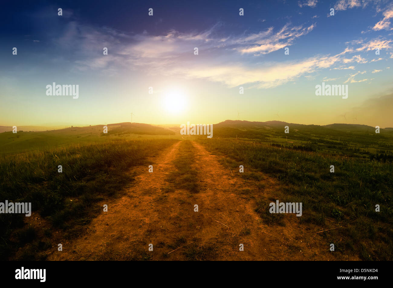 Empty road with cloudy sky and sunlight Stock Photo - Alamy