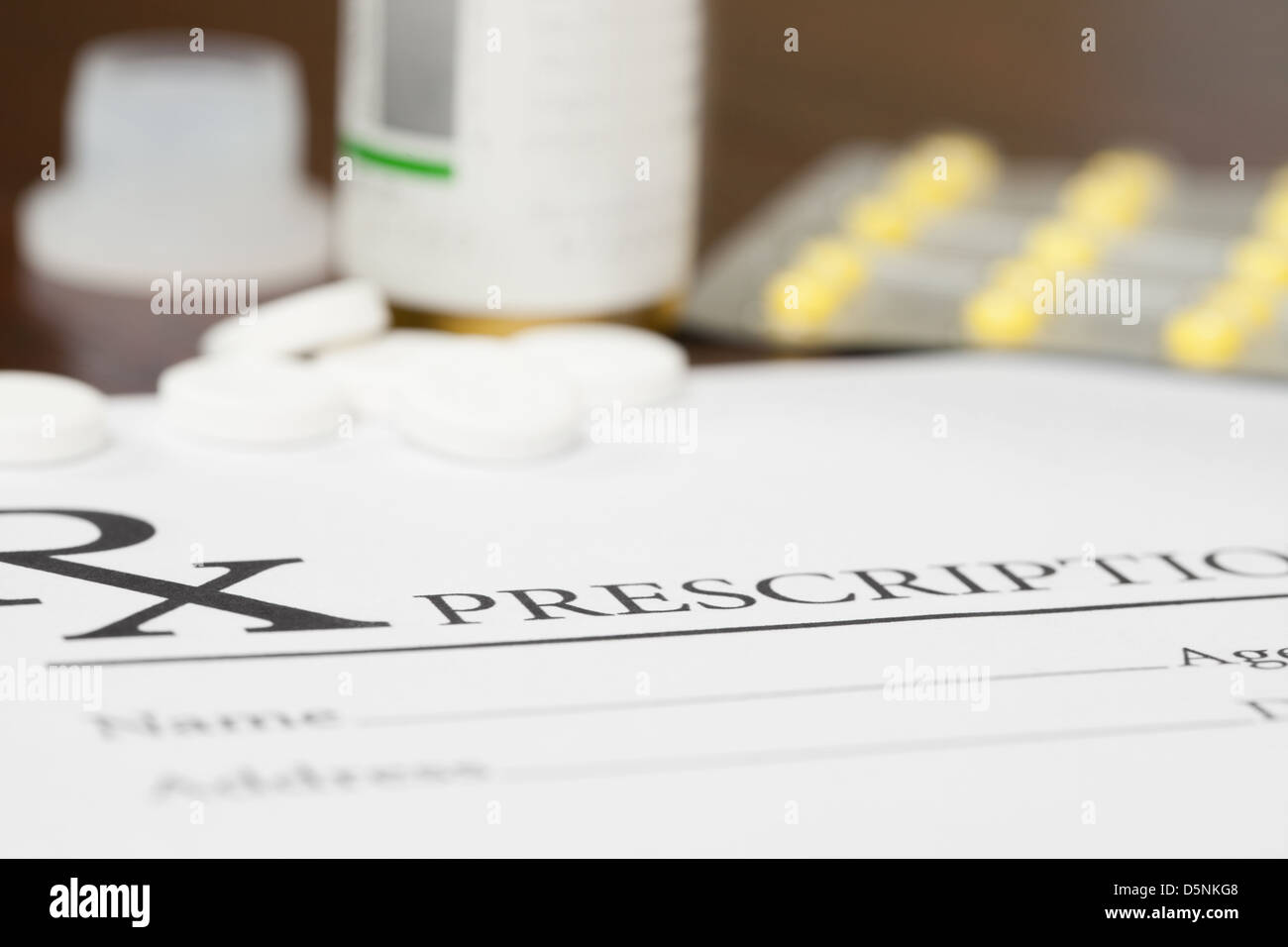 Medical prescription and pills on table Stock Photo - Alamy