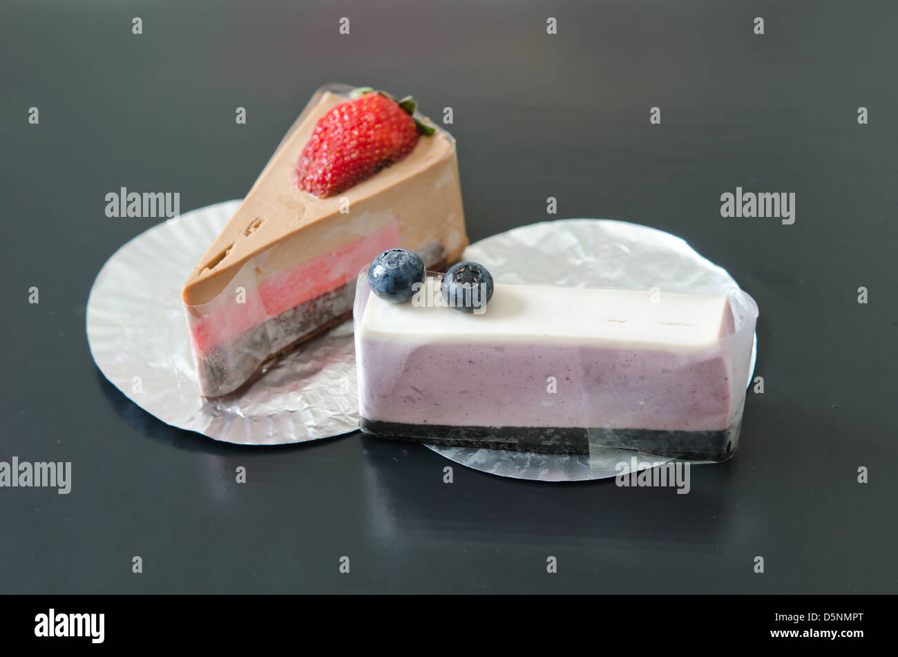 blueberries cheesecake and strawberry cheesecake , sweet dessert Stock Photo