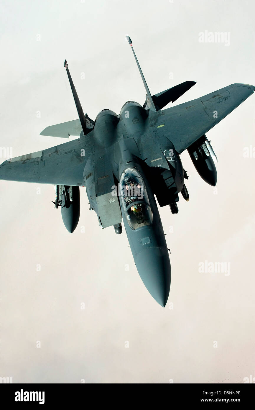 A US Air Force F-15E Strike Eagle resumes combat operations after refueling April 1, 2013 over Afghanistan. Stock Photo