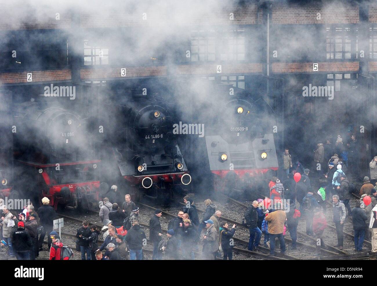 Visitors crowd the former railway depot at the 5th Dresden Steam